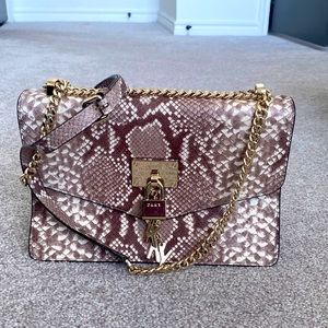 DKNY 100% Cow leather